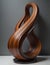 Abstract modern cocobolo wooden sculpture with mainly round shapes, standalone