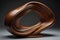 Abstract modern cocobolo wooden sculpture with mainly round shapes, standalone.