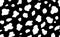 Abstract modern dalmatian fur seamless pattern. Animals trendy background. Black and white decorative vector