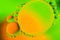 Abstract molecule sctructure. Macro shot of air or molecule. Abstract green orange background. Space or planets abstract backgroun