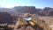 Abstract mountains landscape background with crystal ball, wonderful nature view from the top, petra ancient city in