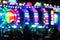 Abstract multi-colored light background with defocused bokeh light. The stage of the entertainment show