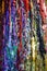 Abstract multicolored background of streaks of wax candles. Stripes of different colors. Close-up.