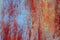 Abstract mystical bloody background with rusty metal texture in