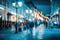 Abstract narrow pedestrian street. Blurred modern city, defocused urban bokeh city lights, silhouettes of the walking