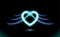 Abstract neon heart with wings, gothic anime, blue glow radiant effect of love for Valentines day. Holiday design, night romance