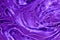 Abstract neon purple, violet cosmetic gel serum background texture