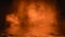 Abstract orange smoke with reflection in water .Lighting spotlighting texture overlays