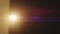Abstract overlay with warm yellow light transition, lens flare flashes effects on dark background. Anamorphic lens