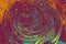 Abstract paint form marbling patterns on colorful background