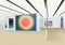 Abstract painting hanging on the wall and stands in the art gallery with suspension ceiling