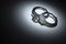 Abstract Pair of Handcuffs Under Spot Light - Text