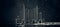 Abstract panorama of city, made by metal bolt and nut chrome. Black background with bokeh.