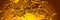 An abstract panoramic image of a gold paint splash on a gold background