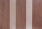 Abstract parallel stripes of beige and light brown on the plastered wall background, close-up, macro.