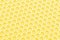 abstract pastel illuminating yellow honeycomb close-up unobtrusive photo background