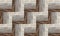 Abstract pattern interwoven gray wooden blocks tightly background rustic