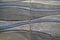 An abstract pattern of wavy lines on concrete