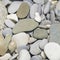 Abstract pebble stones background texture macro, selective focus