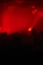 Abstract photo, party, unrecognizable people, red lights. out of focus, defocused lens