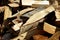 Abstract photograph of piles of natural wooden logs. Background. Harvesting firewood for the winter. Texture. Wood for