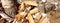 Abstract photograph of piles of natural wooden logs. Background. Harvesting firewood for the winter. Texture. Wood for