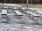 Abstract picture with snowy benches