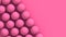 Abstract pink background with beautiful spheres for cosmetics product posters, placards and brochures. Small beads on pink