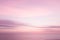Abstract pink sunset sky and ocean nature background.