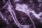 Abstract pink violet magenta creasy velvet fabric background texture
