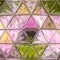 Abstract polygon background with a triangle pattern in pastel pink violet purple color, transparent glass with drops and lilas flo