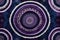 Abstract purple dark blue geometric batik art with spirals diamonds concentric circles