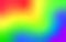 Abstract rainbow background with a smooth, blurry color transition.