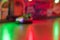 Abstract random colourful defocused blurred go-kart cars of fun fair background pattern
