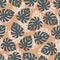 Abstract random seamless pattern with doodle navy blue monstera silhouettes. Orange pastel background