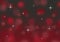 Abstract red and black bokeh Christmas background with twinkling stars