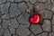 Abstract red heart shape on crack ground nature sunset