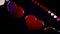 Abstract red hearts flying and rotating in a circle on dark blue background, seamless loop. Beautiful hearts moving