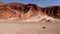 Abstract red mountains rocks and dry river in the Ounila Valley, High Atlas Mountains, Morocco.