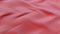 Abstract Red swirling liquid cloth motion seamless background