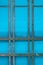 Abstract rendering of metal bars and blue plastic