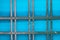 Abstract rendering of metal bars and blue plastic