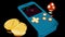 Abstract retro background with a blue tetris and a game on its screen, gold coins and fly agaric mushroom. Design