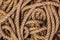 Abstract ropes, cables, hems background, Tangled rope rope background. Jute rope. Shot up close