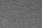 Abstract rough gray surface background. Similar to asphalt, concrete, plastic. Gray matte texture of the cells.