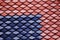 Abstract scene of Red and Blue earthenware tiles or calls tiles consists of fish scales on the roof of temple bangkok thailand - R