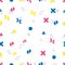 Abstract seamless colorful pattern made of different geometric shapes such as triangle, cross, circle