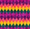 Abstract seamless harlequin pattern from rows of rhombuses in green, yellow, pink and purple