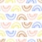Abstract seamless pattern with doodle rainbows. Hand drawing fantastic colorful rainbow in kids drawing style