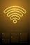 Abstract Shiny Bokeh star pattern Wifi symbol, Internet connect concept design gold color illustration isolated on brown gradient